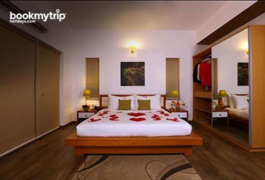 Bookmytripholidays | Swiss County Resort,Munnar  | Best Accommodation packages